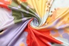 Шёлк-атлас с крупным растительным узором в ярких тонах