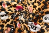 Трикотаж велюр стрейч D&G леопард чёрно-коричневые пятна по песочному фону фото в интернет-магазине Ауратессу