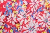 Хлопок-жаккард стрейч Dolce&Gabbana жёлтые, синие цветы на красном фоне